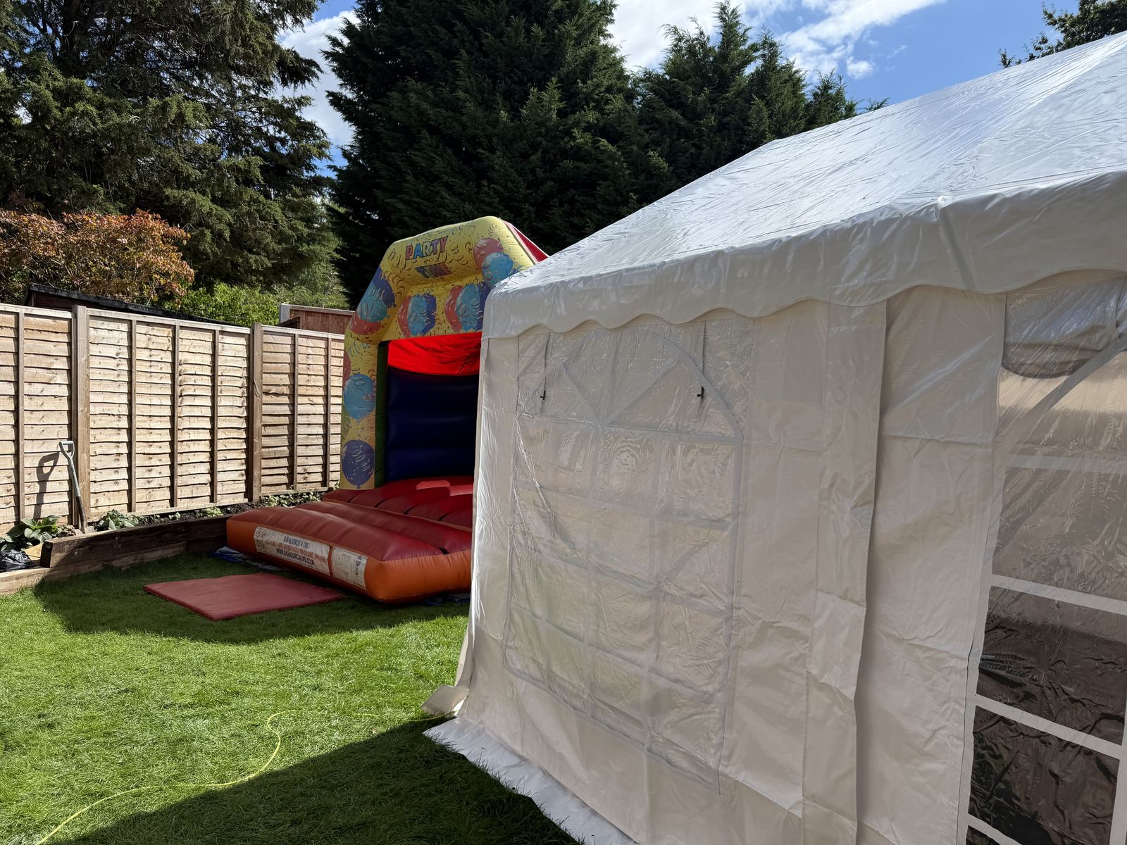 Castle standing on the lawn by the marquee side wall, as set up near Northfield